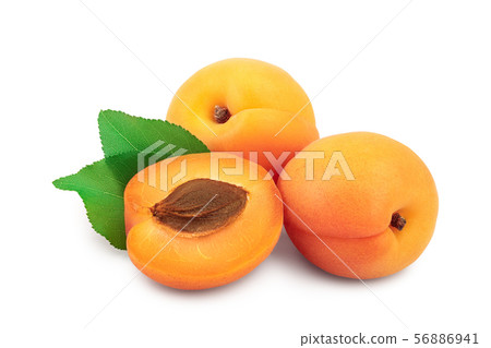 Apricot fruit with half isolated on white background macro 56886941