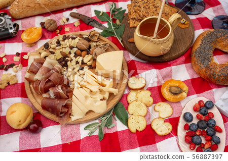 Summer outdoor picnic party. Food, honey and 56887397