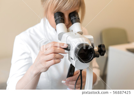 Young female professional gynecologist in the Young female professional gynecologist in the 56887425