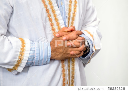Pastor Praying Hands Before Baptism Ceremony Pastor Praying Hands Before Baptism Ceremony 56889826