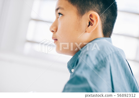 Boy elementary school student study 56892312