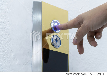 Hand push the elevator button up 56892911