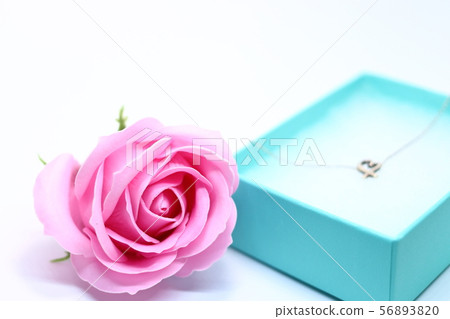Heart necklace and roses in a gift box Heart necklace and roses in a gift box 56893820