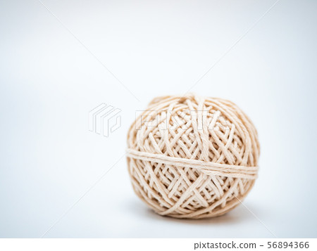 wool ball on light grey background 56894366
