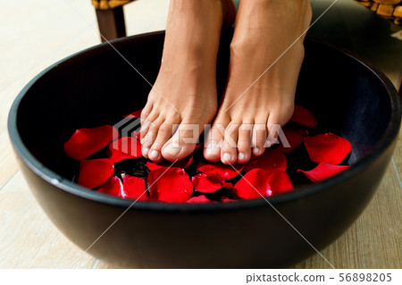 Foot washing in the spa salon. Foot washing in the spa salon. 56898205