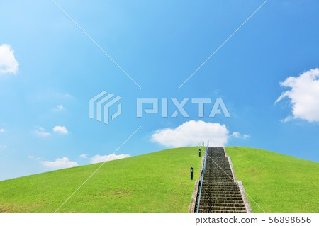 Summer park with blue sky and hill Summer park with blue sky and hill 56898656