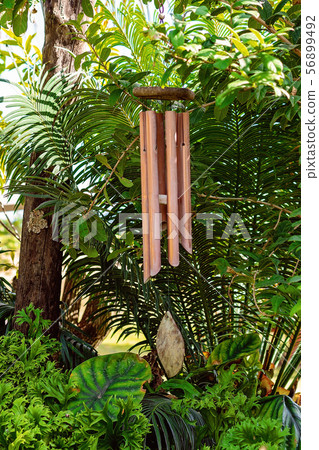 Tinkling Wind Chimes In A Garden Tinkling Wind Chimes In A Garden 56899492