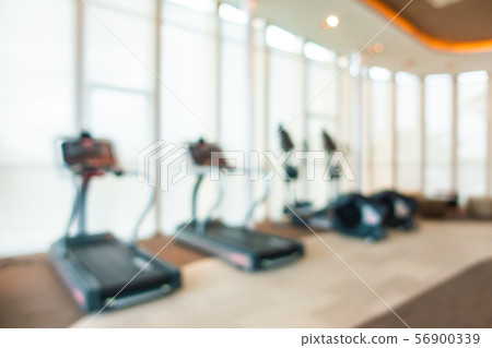 Abstract blur and defocus fitness equipment in gym room interior Abstract blur and defocus fitness equipment in gym room interior 56900339
