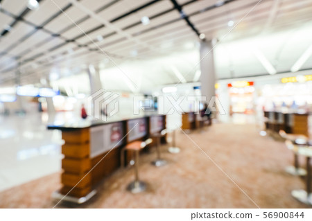 Abstract blur and defocused airport terminal interior Abstract blur and defocused airport terminal interior 56900844