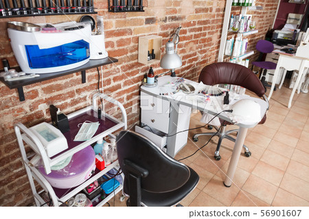Image of work place with various nail varnishes Image of work place with various nail varnishes 56901607