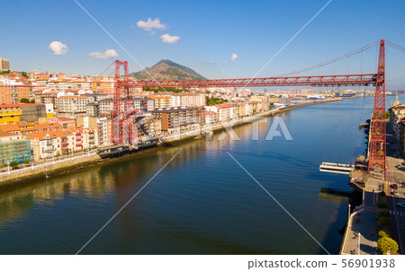 Aerial view of modern Vizcaya bridge crossing river at Portugalete 56901938