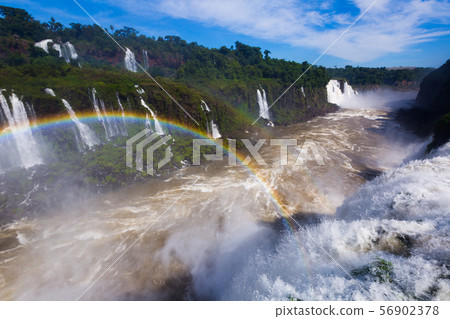Rainbow over Cataratas del Iguazu waterfall, Brazil Rainbow over Cataratas del Iguazu waterfall, Brazil 56902378
