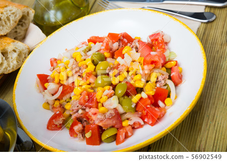 Salad with canned tuna, olives and corn Salad with canned tuna, olives and corn 56902549