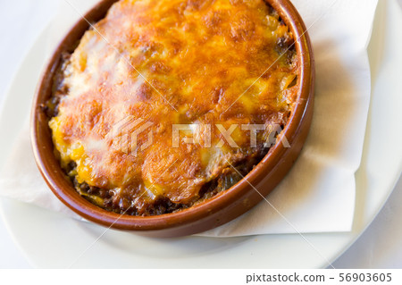 Baked minced meat with cheese Baked minced meat with cheese 56903605