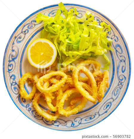 Calamari in a batter of tempera flour and fresh salad with lemon Calamari in a batter of tempera flour and fresh salad with lemon 56903782