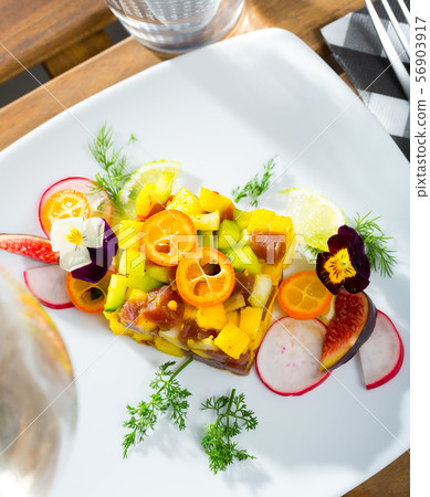 Tasty tartar with fresh tuna, mango, avocado 56903917