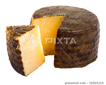 Cheese manchego with cut piece 56904229