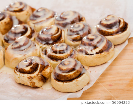 Freshly baked cinnabon buns Freshly baked cinnabon buns 56904233