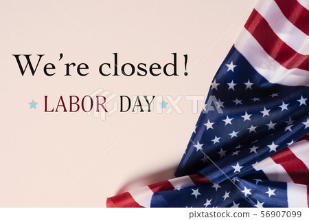 american flags and text we are closed, labor day 56907099
