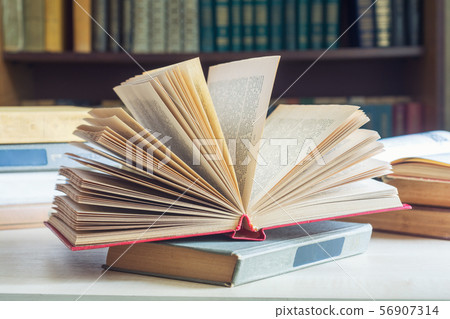 Collection of old books in library Collection of old books in library 56907314