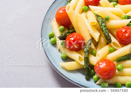 Penne pasta salad with asparagus , tomatoes and Penne pasta salad with asparagus , tomatoes and 56907380