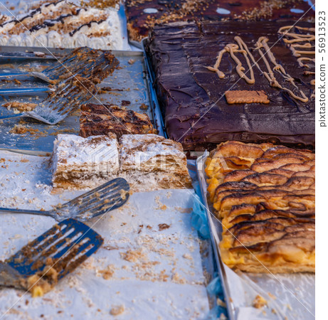 Set of portions of creamy layer cake napoleon on a 56913523