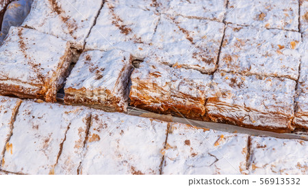 Set of portions of creamy layer cake napoleon on a Set of portions of creamy layer cake napoleon on a 56913532