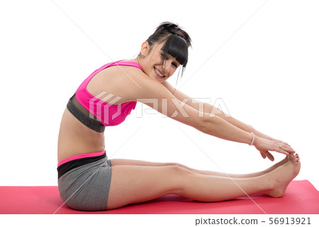 smiling young woman girl doing exercise on floor smiling young woman girl doing exercise on floor 56913921
