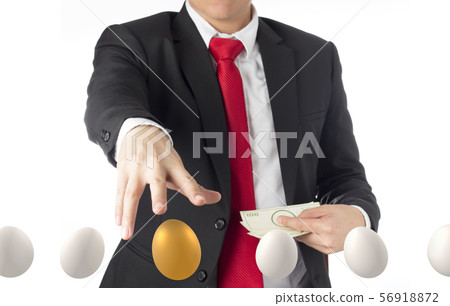business man invest in gold egg , concept risk investment in trading asset business man invest in gold egg , concept risk investment in trading asset 56918872
