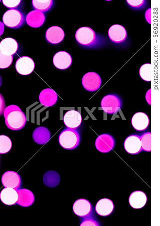 Unfocused abstract purple bokeh on black 56920288