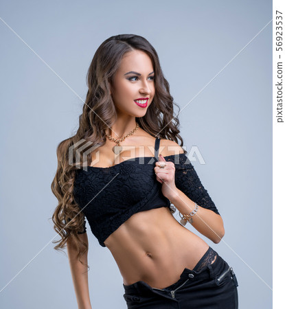 Gorgeous brunette advertises fancy clothes 56923537