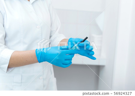Portrait of a young nurse in medical outfit and Portrait of a young nurse in medical outfit and 56924327
