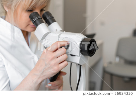 Young female professional gynecologist in the Young female professional gynecologist in the 56924330