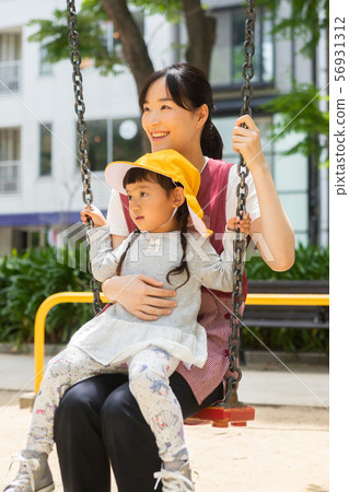Preschoolers and children playing in the park Preschoolers and children playing in the park 56931312