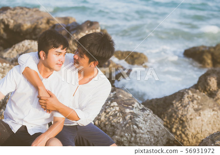 Homosexual portrait young asian couple sitting hug Homosexual portrait young asian couple sitting hug 56931972