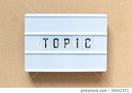 White lightbox with word topic on wood background 56932571