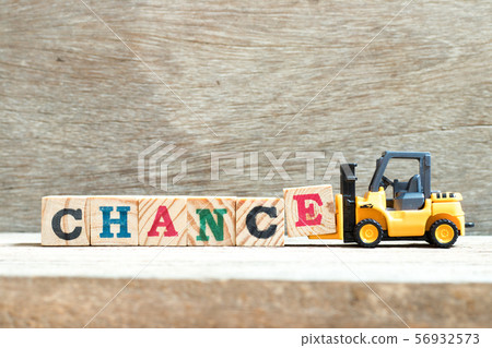 Toy forklift hold letter block E to word chance 56932573
