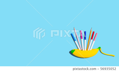Banana shaped pen case with pens and pencils 56935052