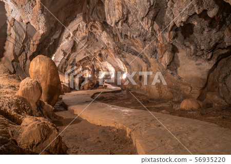 pathway underground cave in Laos, with stalagmites 56935220