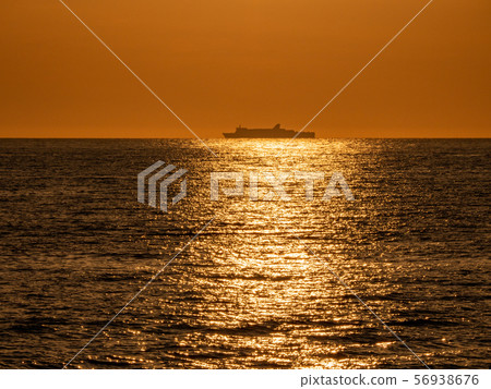 Echizen Kaga Kaigan Quasi-National Park, Tojinbo evening view, large passenger boat silhouette 56938676
