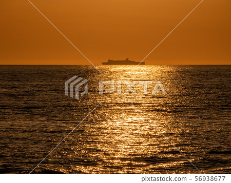 Echizen Kaga Kaigan Quasi-National Park, Tojinbo evening view, large passenger boat silhouette 56938677