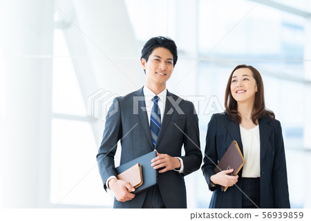 Business image Male employee Female employee Business image Male employee Female employee 56939859