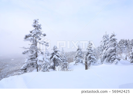 Tokachidake mountain range snow scene seen from Tokachidake Onsen Tokachidake mountain range snow scene seen from Tokachidake Onsen 56942425