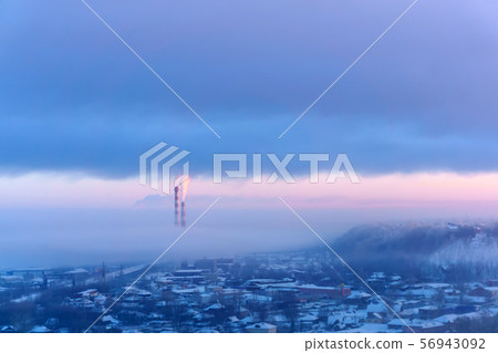 evening landscape of a winter industrial zone with 56943092
