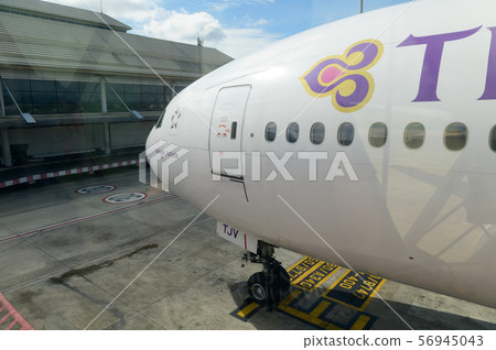 Thai Airways Boeing 777-200ER Parked at Chiang Mai airport Thai Airways Boeing 777-200ER Parked at Chiang Mai airport 56945043
