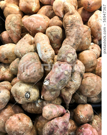 A lot of batata on sale at farms market 56947367