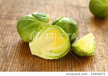 fresh brussels sprouts on a wooden board fresh brussels sprouts on a wooden board 56948071