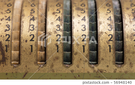 Vintage manual adding machine isolated 56948140