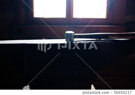 Blacksmith's hammer on the anvil Blacksmith's hammer on the anvil 56950217