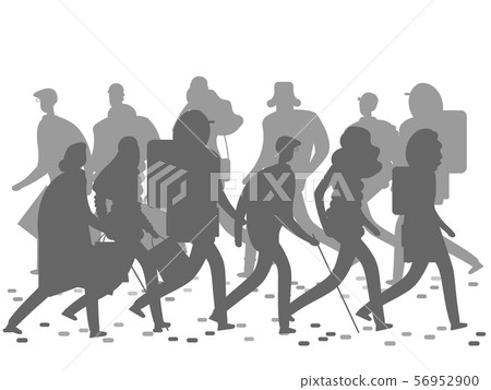 People silhouettes walking on the winter or autumn street. People silhouettes walking on the winter or autumn street. 56952900